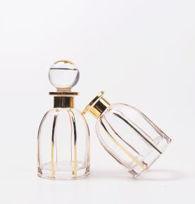 Gilded perfume display bottle